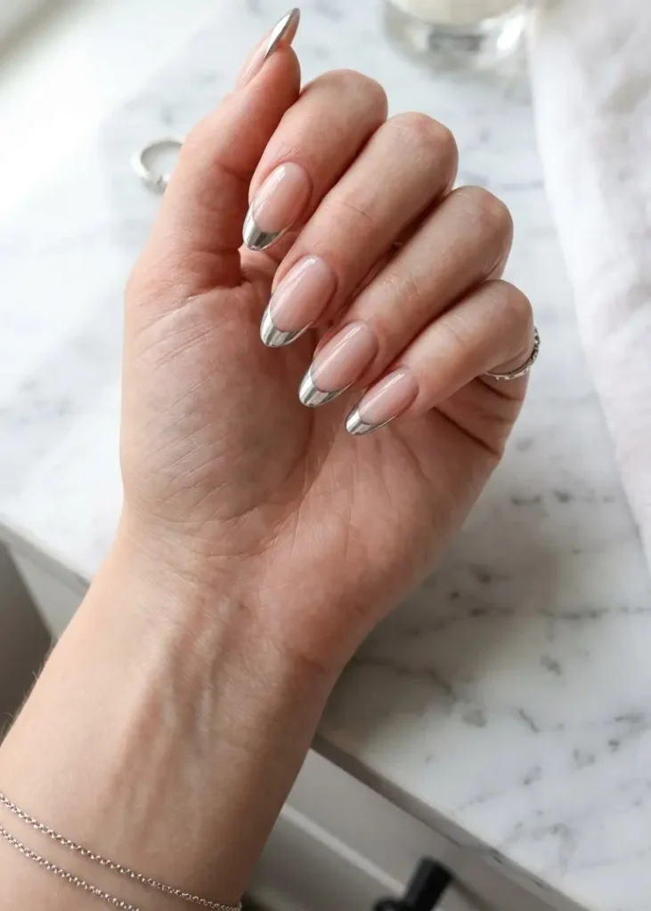 Chrome Silver French Tip Almond Nails On Nude Base