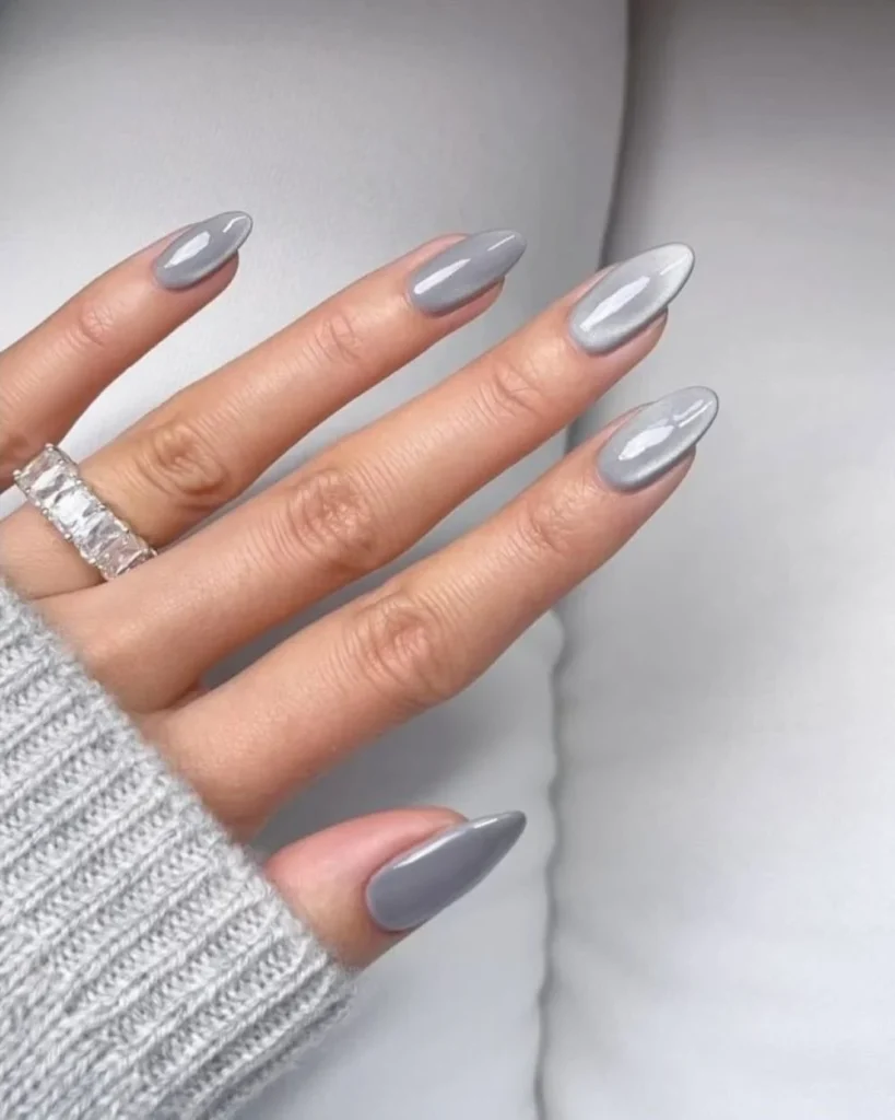 Glossy grey almond nails