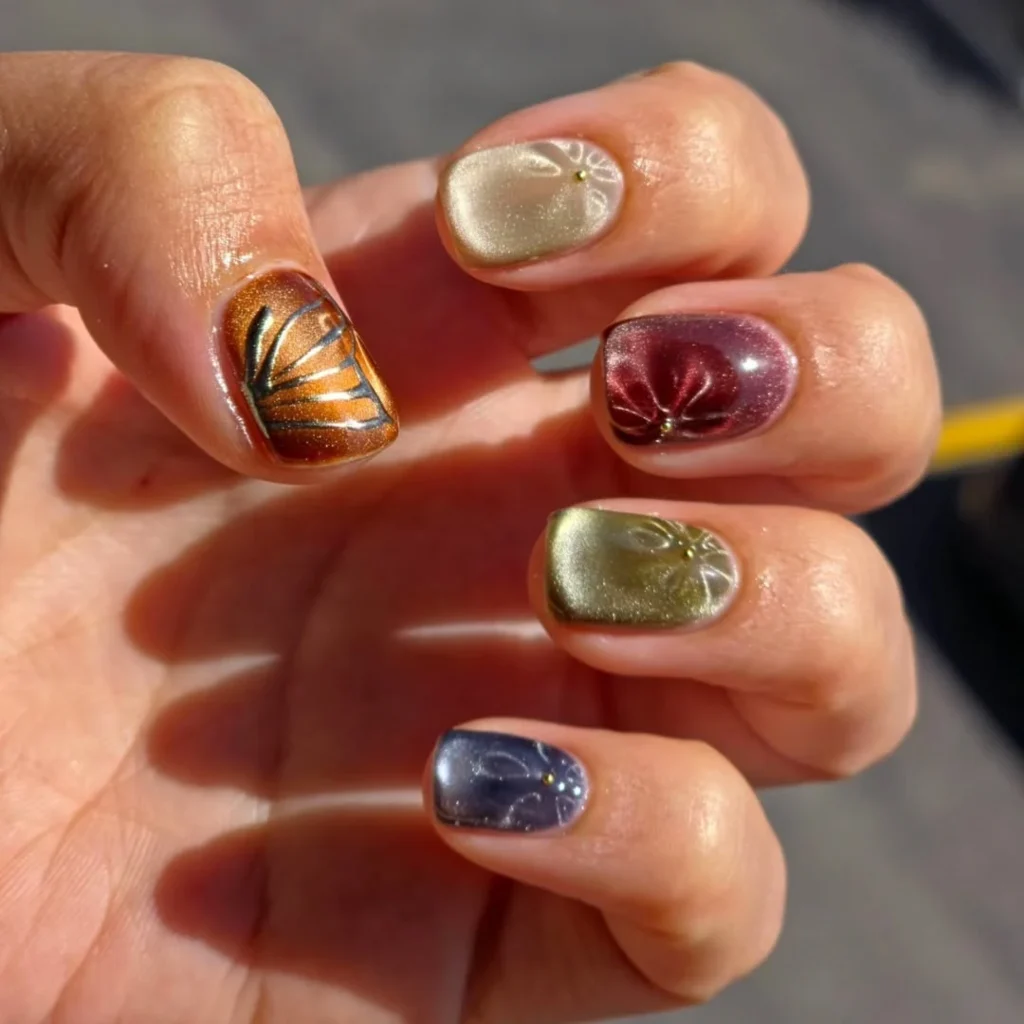 Jewel Tone Nails with Butterfly and Floral Art