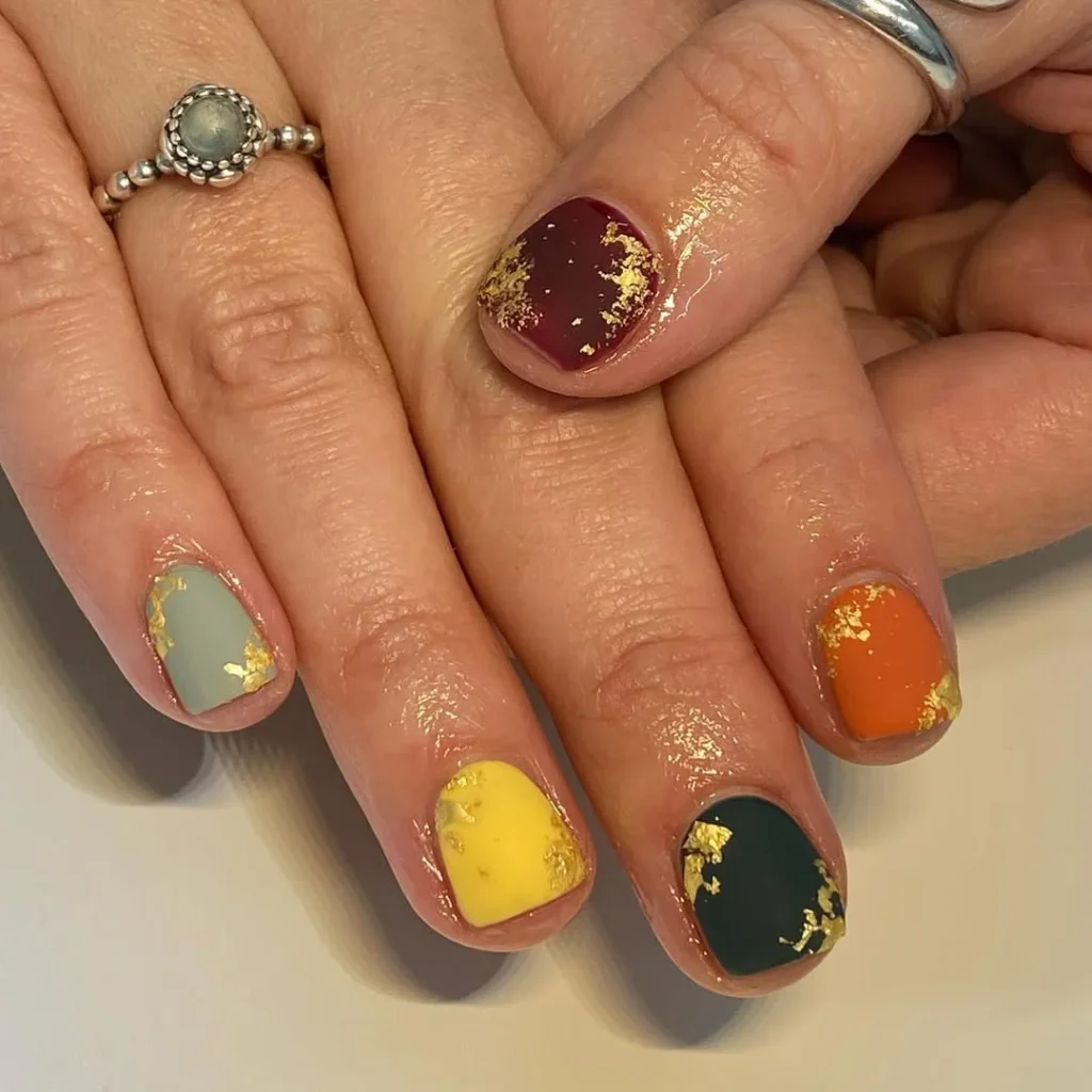 Mismatched Jewel Tone Nails with Gold Foil Flakes