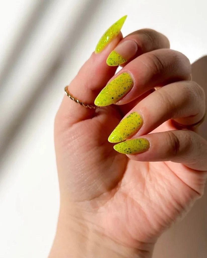 Neon Yellow Speckled Stiletto Nails