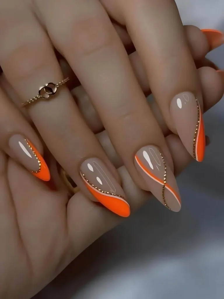 Neon orange swirl nails