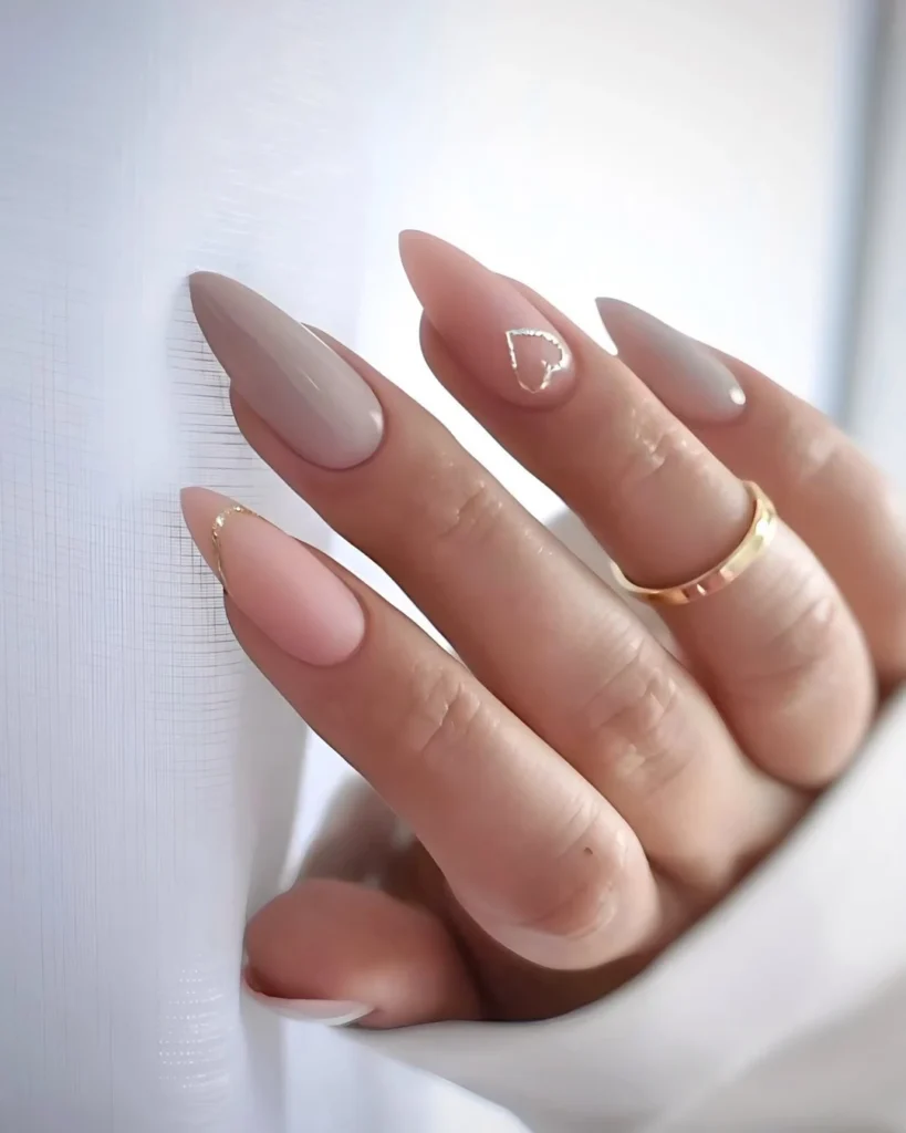 Quiet Luxury Nude Nails with Gold Heart Accent 