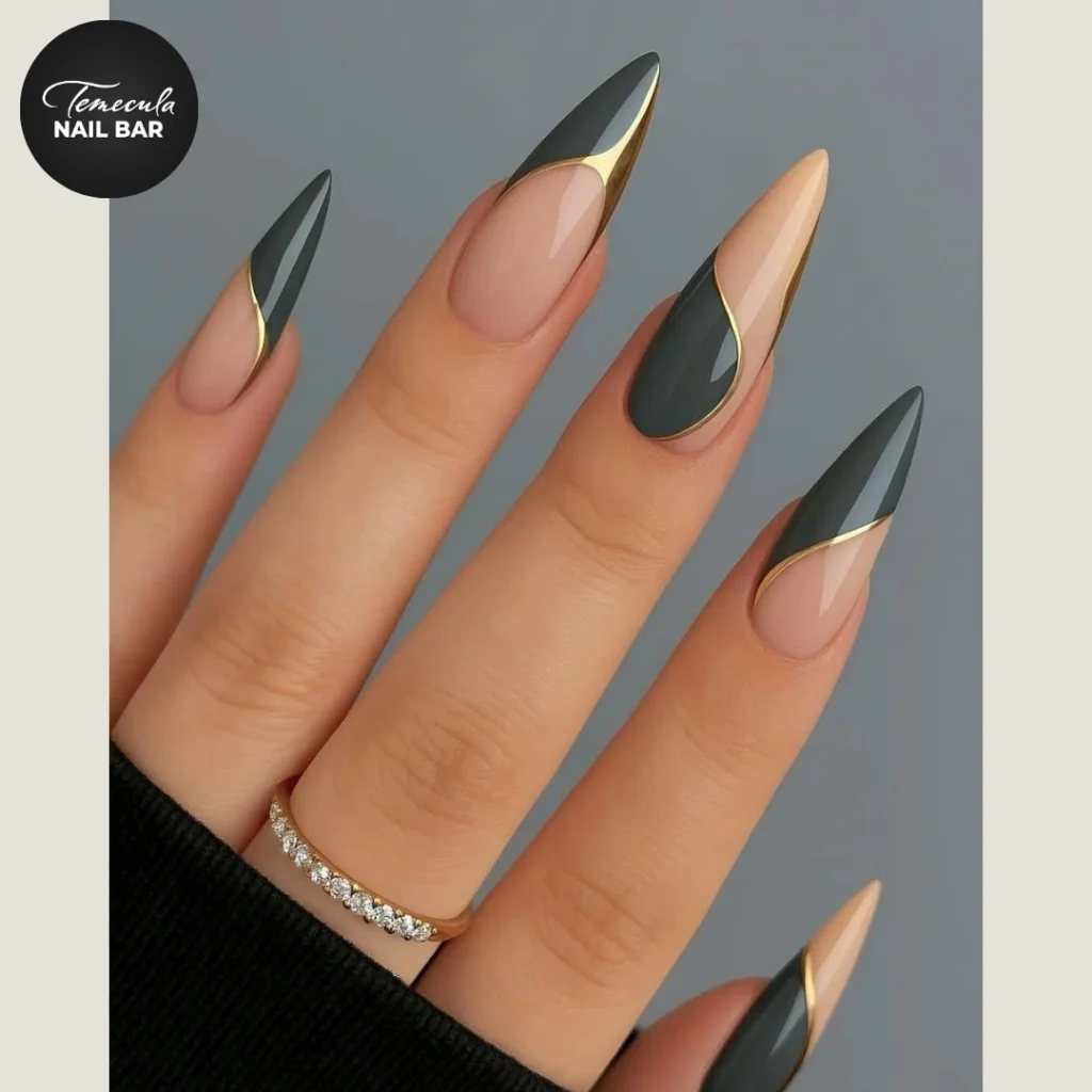 Sleek Charcoal Gold Swoop Stiletto Nails