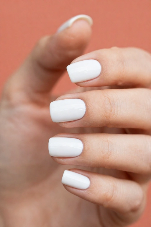 perfectly smooth white nail polish applied without streaks